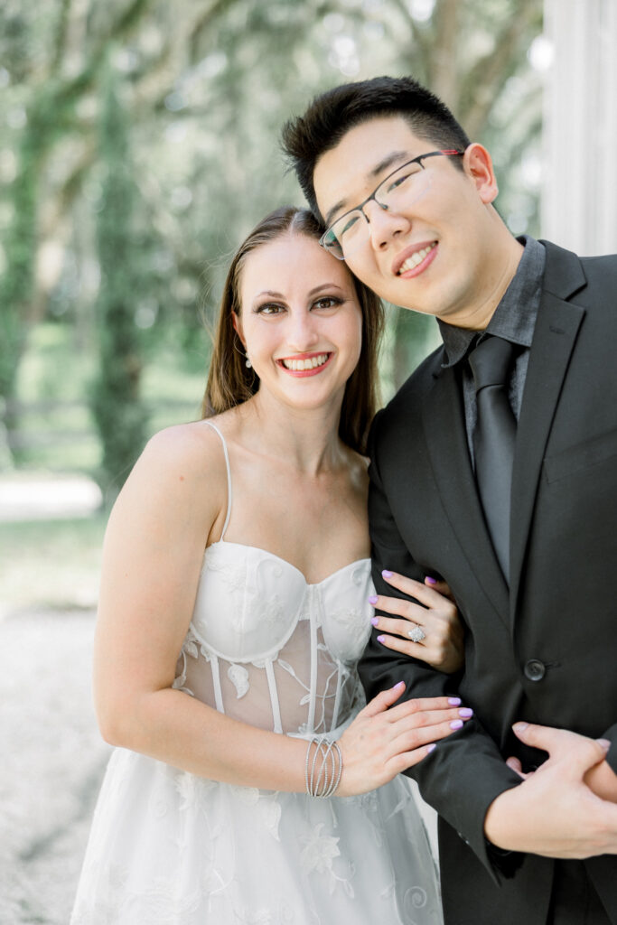 Couple laughing together during Florida engagement session
