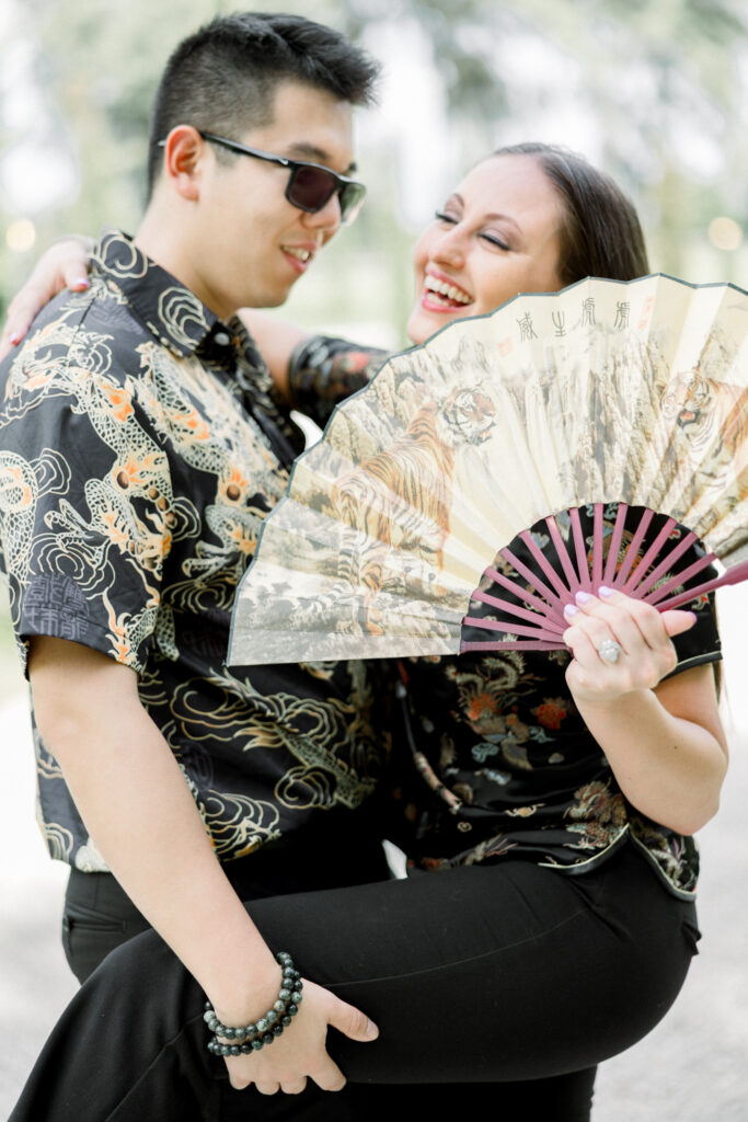 Couple laughing together during Florida engagement session