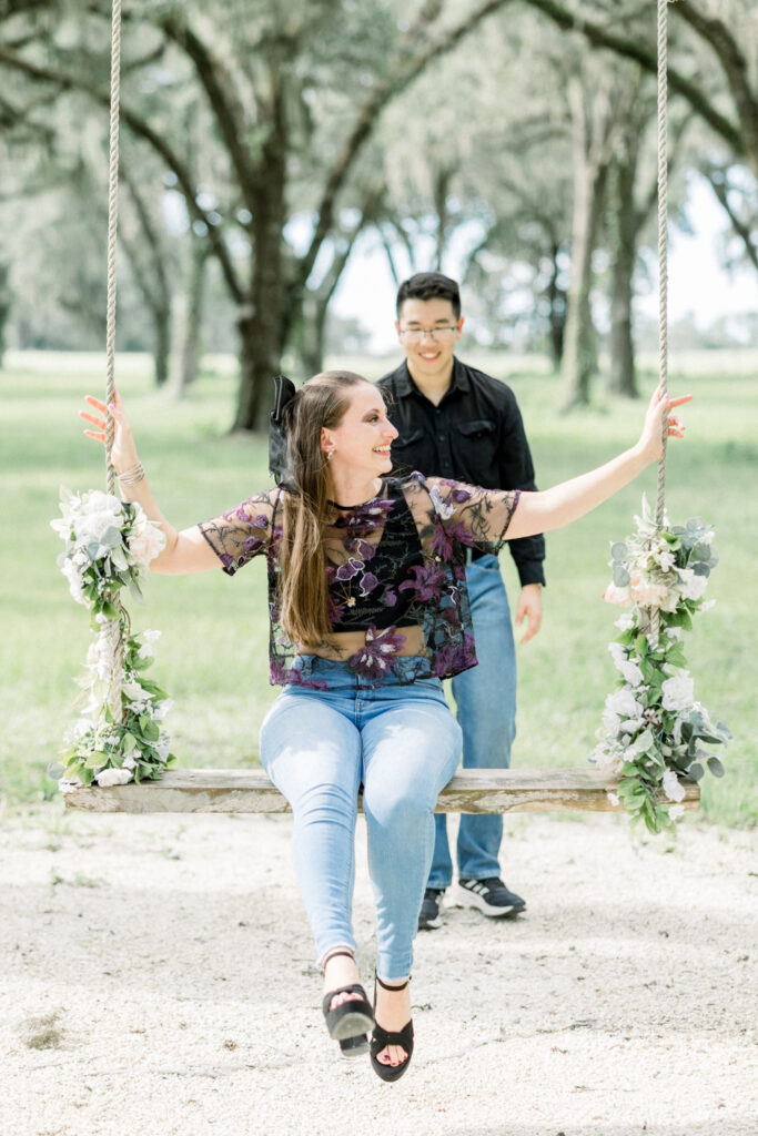 Couple laughing together during Florida engagement session